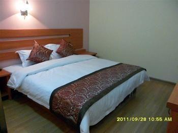 Tiandi Renhe Hotel Цзинань Экстерьер фото